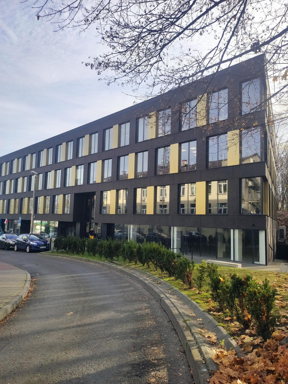 Modern office building with glass facade on a clear day